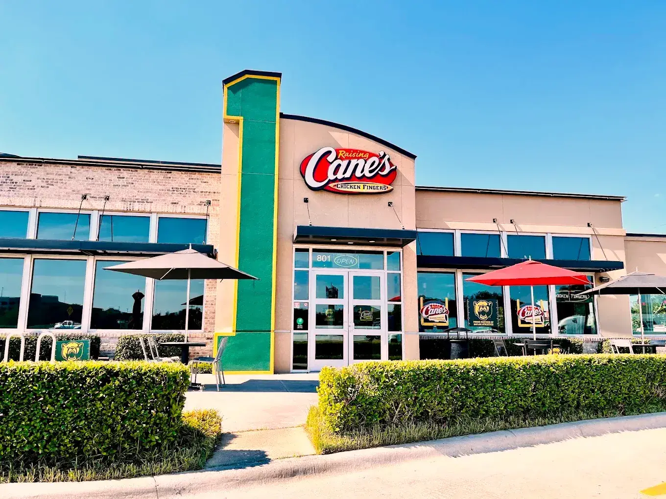 Raising Cane's near Baylor in Waco, with hedges and turf maintained by H&M.